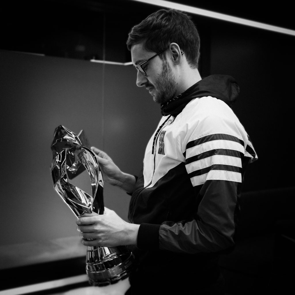 Bjergsen holding the LCS trophy that he is desperate to retain.