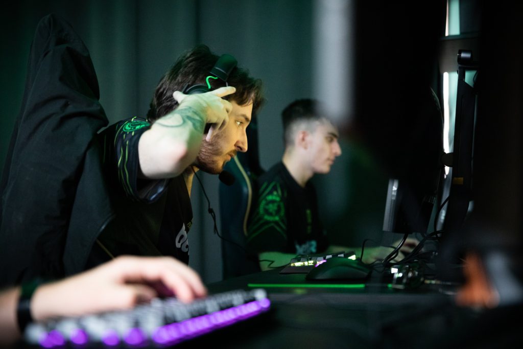 An image of Hampus and the rest of the NiP squad playing on their computers.