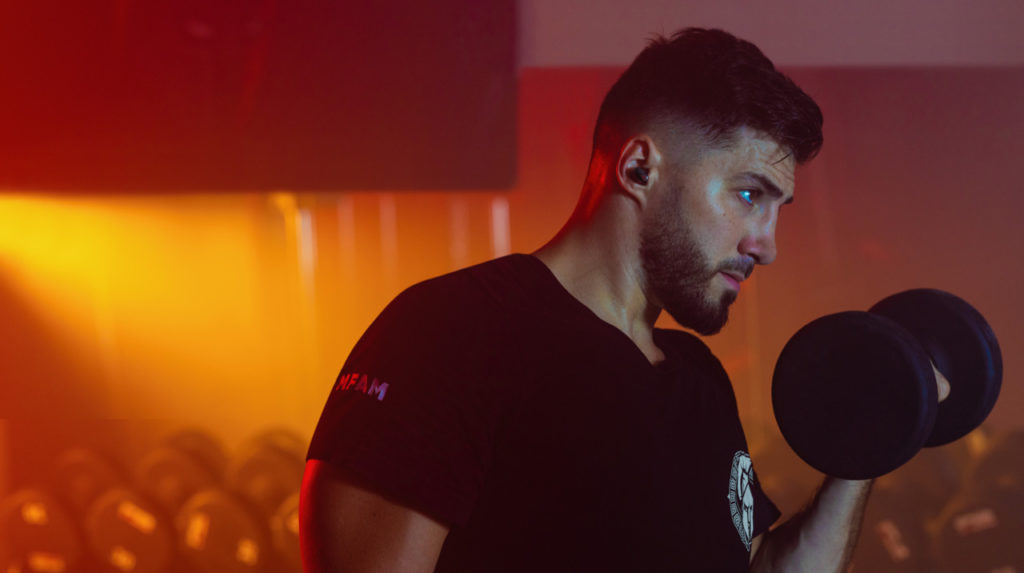 Nickmercs rocking the Beats Studio Buds during a workout