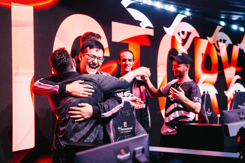 Team Secret celebrating their victory - Puppey in background