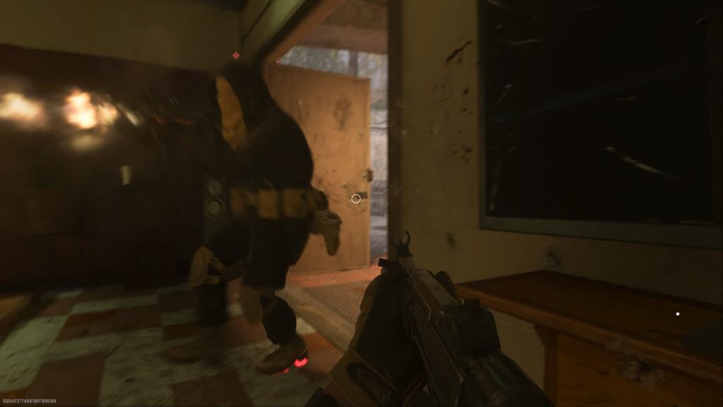 An enemy in MW2 rushes through a doorway as the player waits to get a point-blank kill.