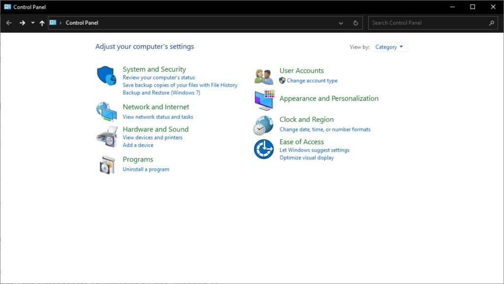 The control panel shows a variety of settings options, including how to uninstall a program.