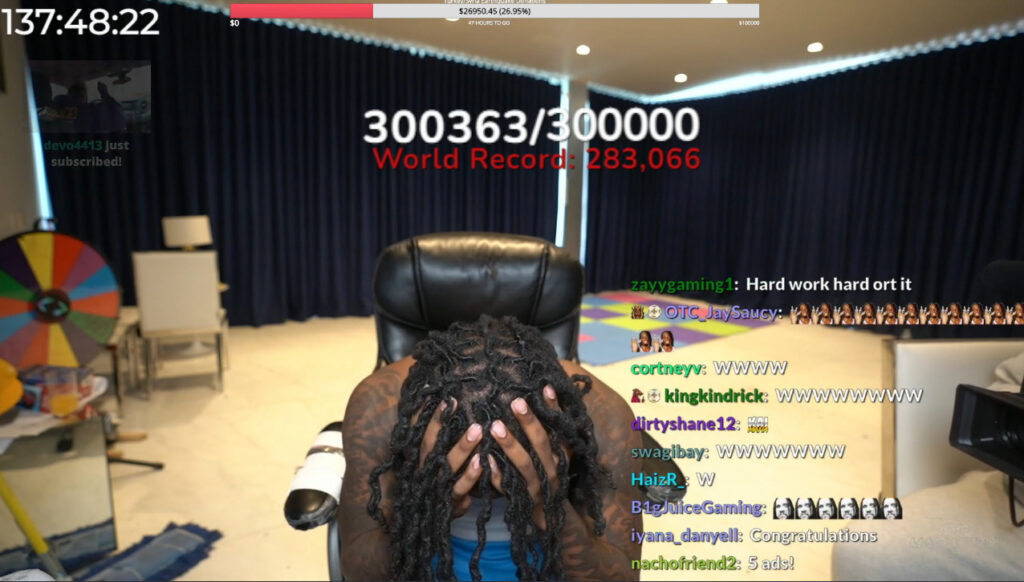 Passing 300k subs was a clearly emotional moment for Kai Cenat, who took time to digest the milestone. Screenshot from Kai Cenat's Twitch channel.