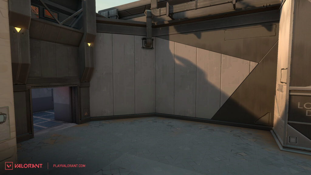 The before look at A Site's back wall near Defender spawn.