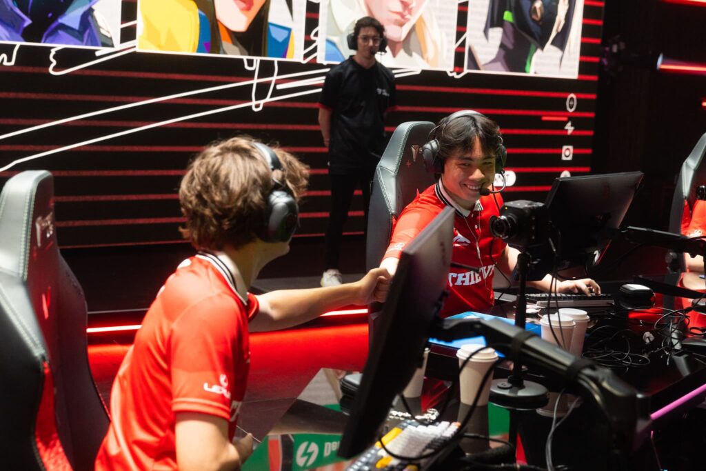 Peter "Asuna" Mazuryk (L) and Matthew "Cryocells" Panganiban of 100 Thieves fist bump after victory against Evil Geniuses during Week 2 of 2023 VCT Americas at the Riot Games Arena on April 10, 2023.