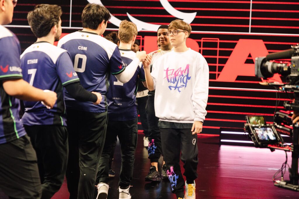 Evil Geniuses (L) and FURIA Esports fist bump onstage after competing during Week 4 of 2023 VCT Americas at the Riot Games Arena on April 22, 2023.