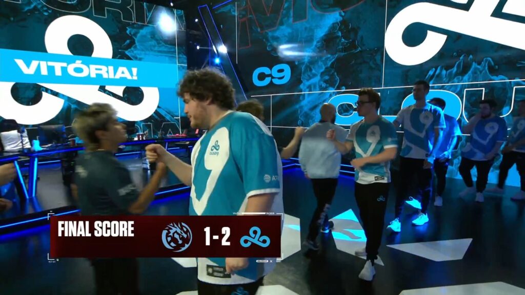 The final score of C9 vs. LEV is shown as Onur leads LEV in a post-match line to fist bump the C9 players.