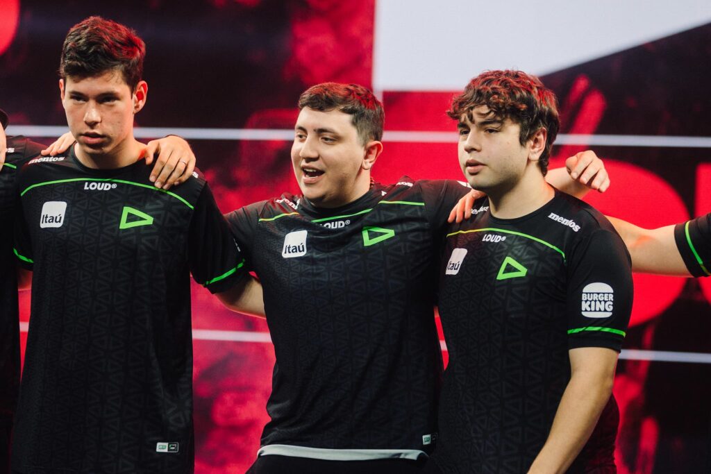 (L-R) Cauan "cauanzin" Pereira, Matias "Saadhak" Delipetro and Felipe "Less" Basso of LOUD pose onstage after victory during Week 6 of 2023 VCT Americas at the Riot Games Arena on May 7, 2023.