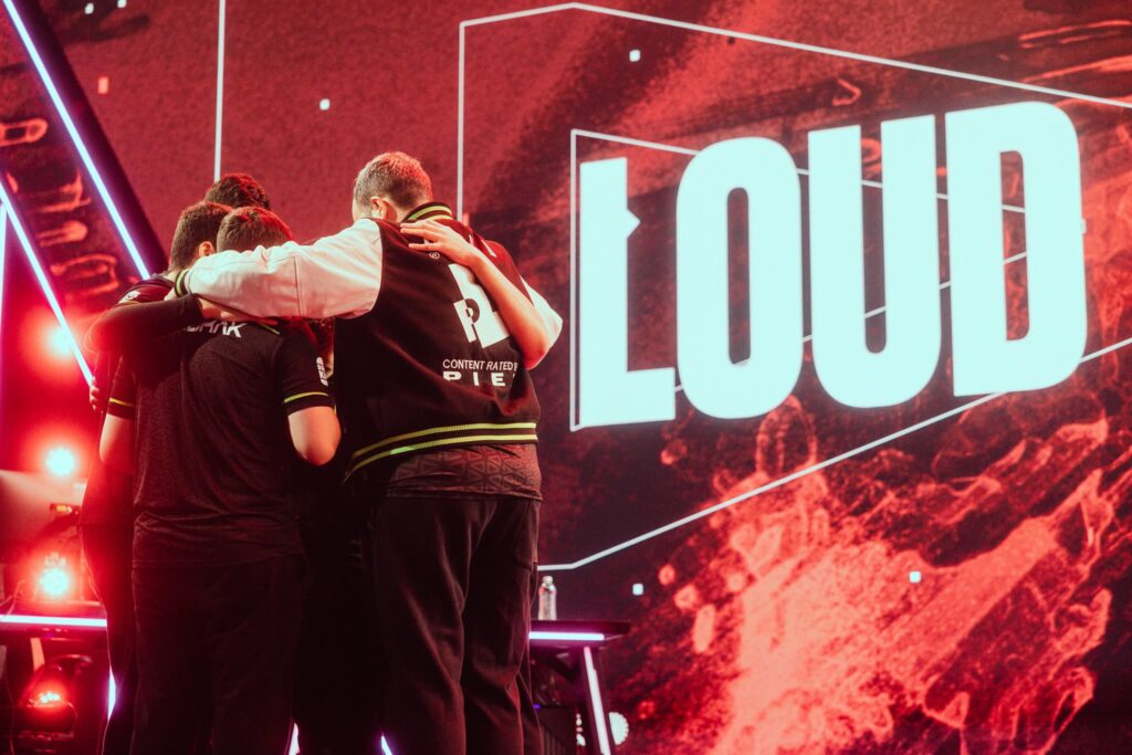 LOUD huddles onstage before competing during Week 6 of 2023 VCT Americas at the Riot Games Arena on May 7, 2023.