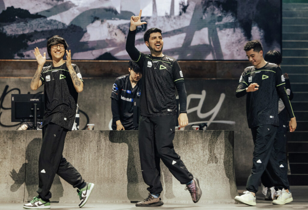 LOUD celebrating their win on stage - image via Colin Young-Wolff/Riot Games