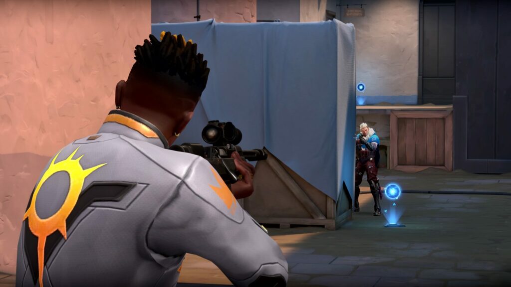 Phoenix and Sova stare each other down across one of VALORANT's new Team Deathmatch maps.