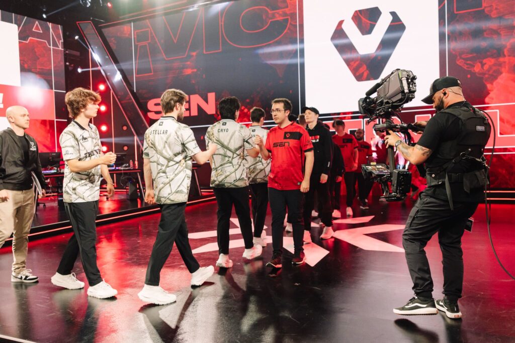 Sentinels (R) greet 100 Thieves onstage after their victory during 2023 VCT Americas Last Chance Qualifier at the Riot Games Arena on July 16, 2023.