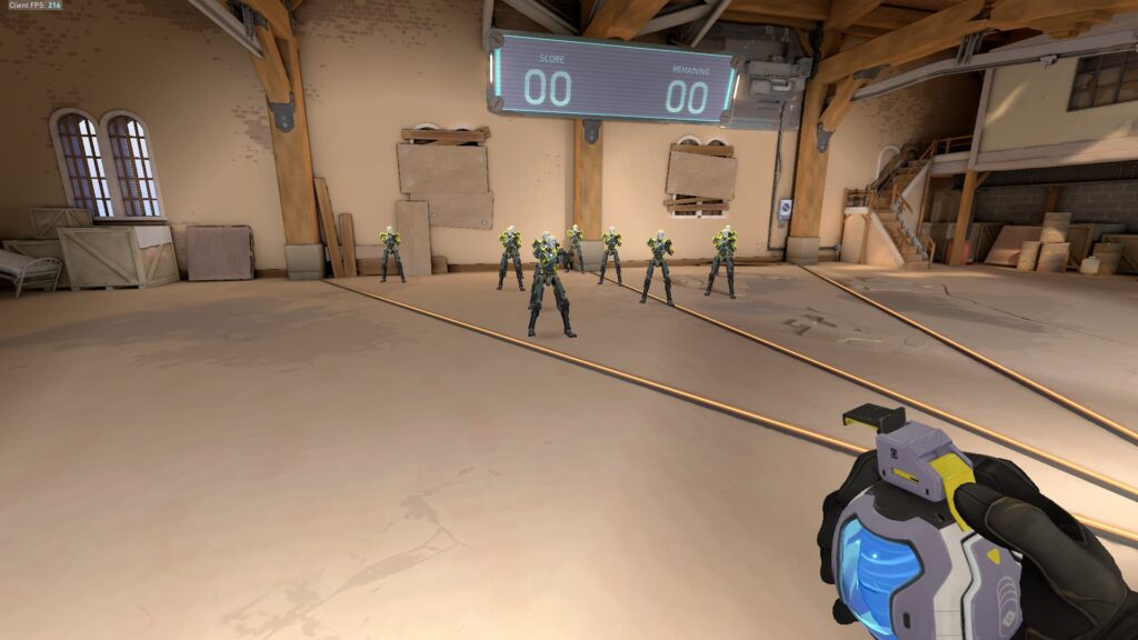 Deadlock holds her GravNet grenade in front of multiple bots in the Range in VALORANT.