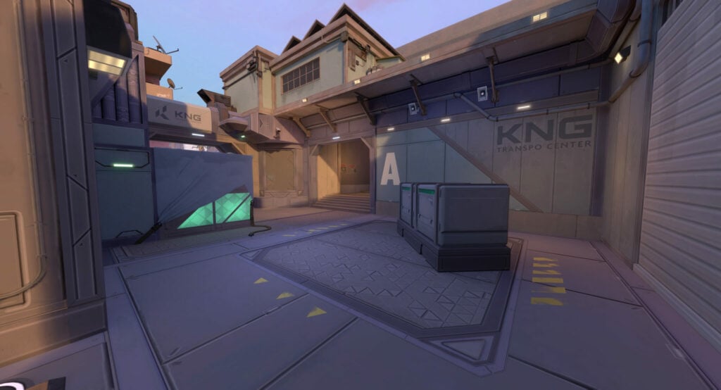 Kingdom architecture provides cover, Radianite boxes, and buildings near A Site on Sunset, the new VALORANT map.