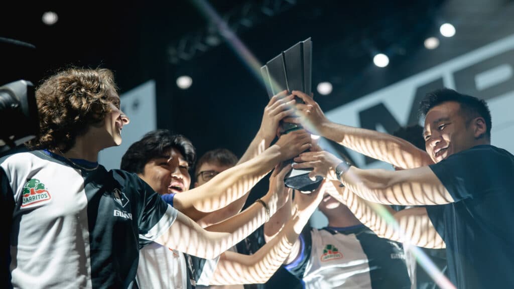 The Guard holds up their VCT Americas Ascension trophy that put them in the VCT for 2024.