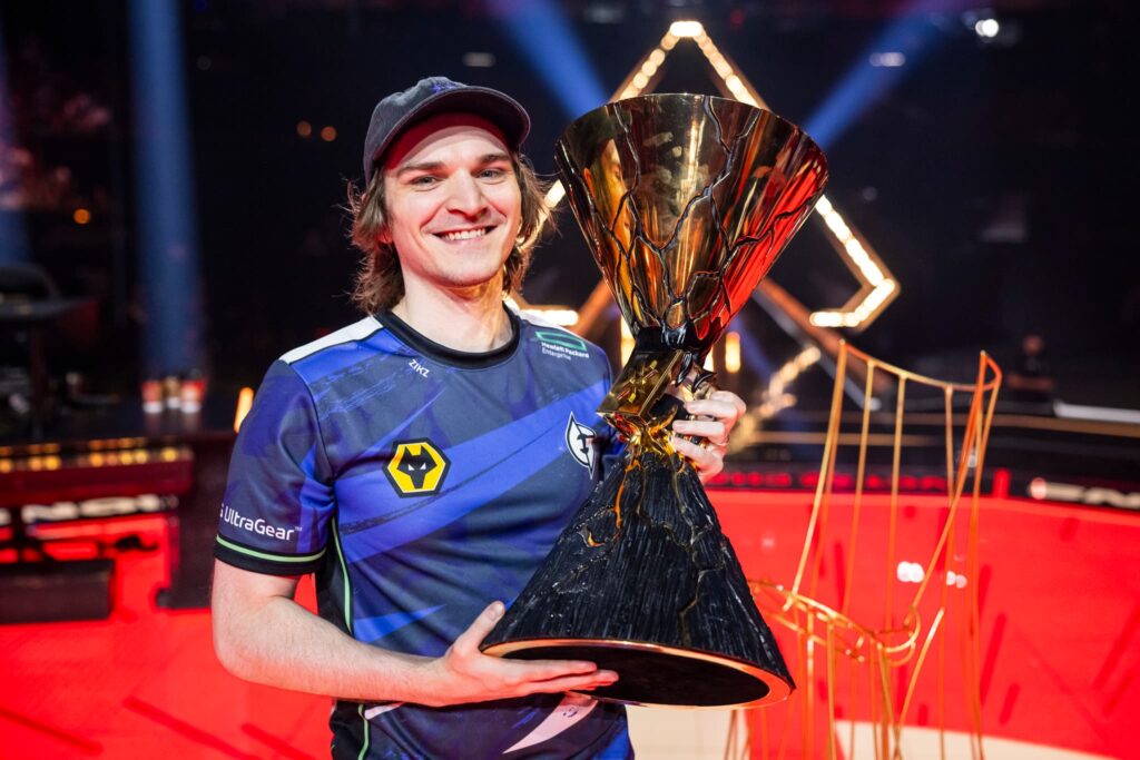Coach Tony "Zikz" Gray of Evil Geniuses poses with the VALORANT Champions Los Angeles Trophy after victory at the Grand Finals at the Kia Forum on August 26, 2023 in Los Angeles, California.