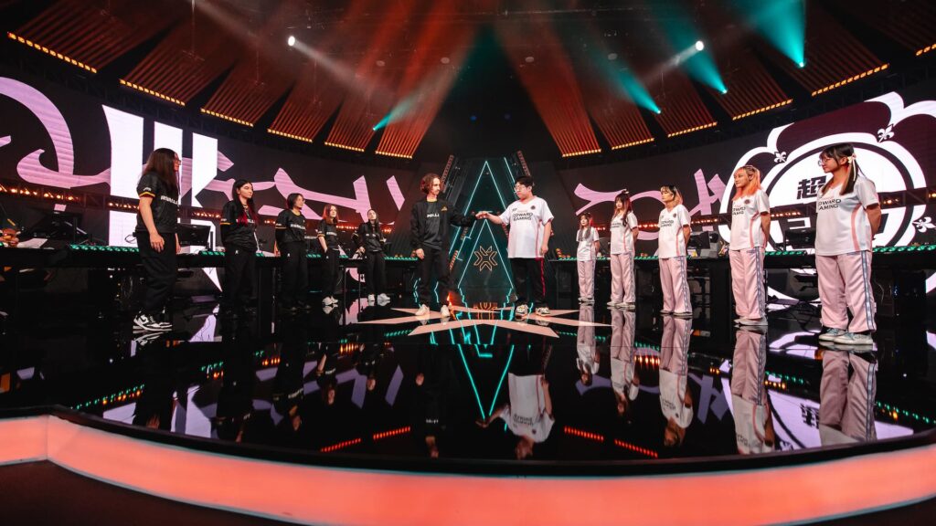 Shopify Rebellion coach effys and Chao Hui EDward Gaming coach fistbump and make an entrance onstage at the 2023 VALORANT Game Changers Championship Quarterfinals at CBLOL Studio in São Paulo, Brazil on November 29, 2023.