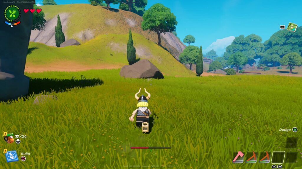 Magnus runs towards a large rock in LEGO Fortnite.