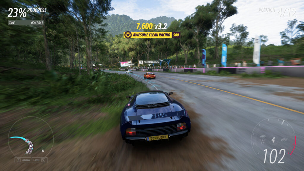 A car races along a track and has received an Awesome Clean Racing bonus.