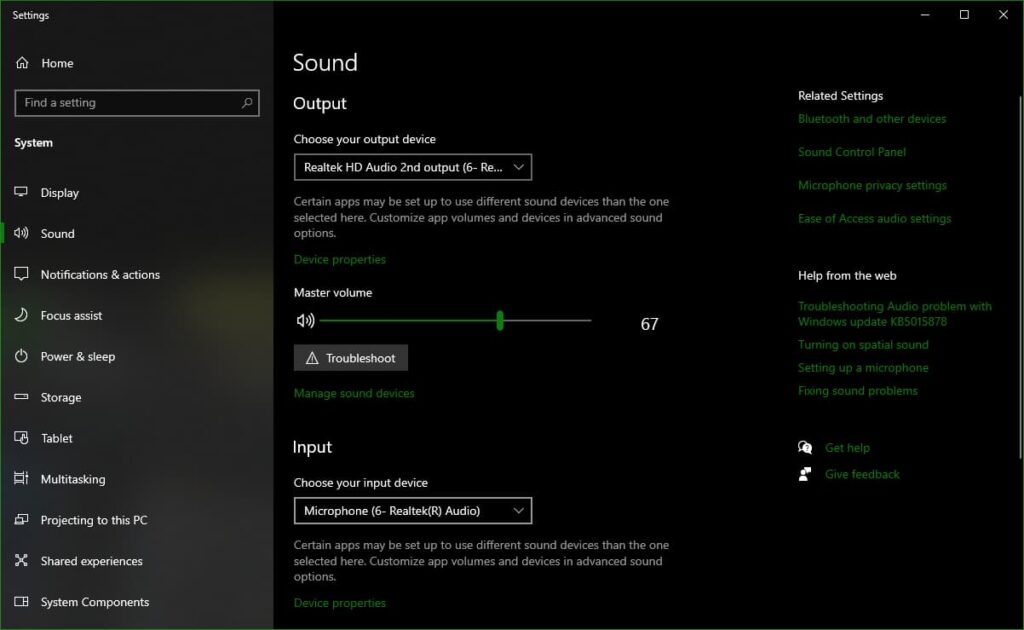 Windows PC sound settings showing output and input devices.