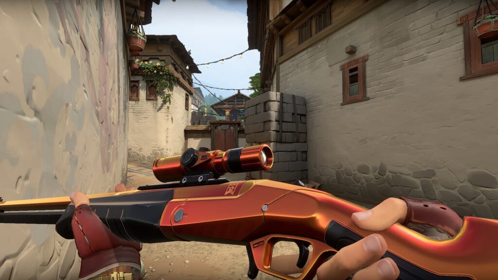 The orange version of the Prism//Reloaded Outlaw from the VALORANT Throwback Pack bundle.