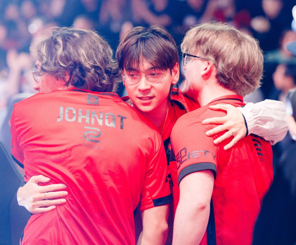 Sentinels player TenZ hugs teammates johnqt and Zellsis after victory at VCT Americas Kickoff on Day 3 of Week 2 at Riot Games Arena on February 25, 2024. 