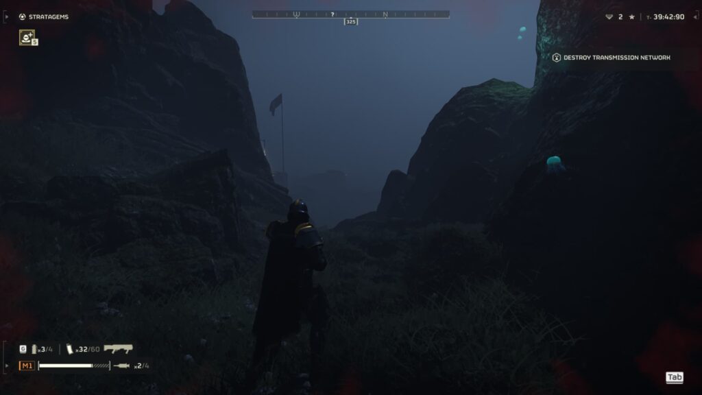 A solo player stands between two rock formations in Helldivers 2.