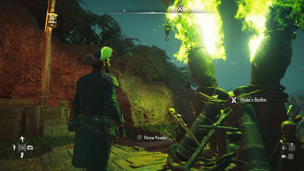 A pirate views the Pirate's Bonefire burning green after throwing powder on it.