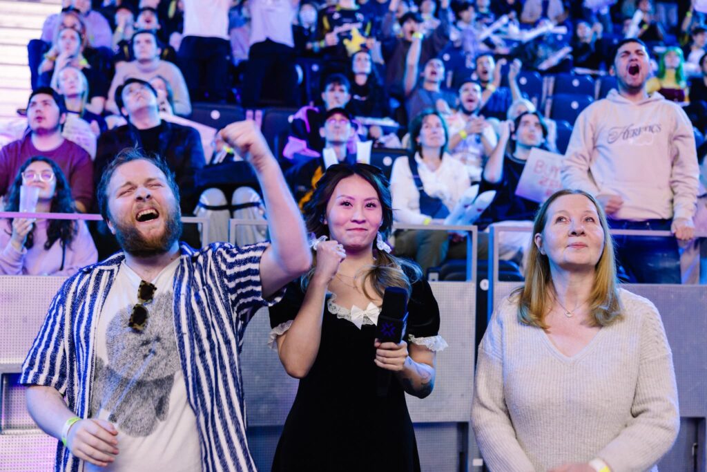 Esports host Yinsu Collins interviews benjyfishy's brother and mom onstage at VALORANT Masters Madrid Swiss Stage Day 2 at the Madrid Arena on March 15, 2024 in Madrid, Spain. 