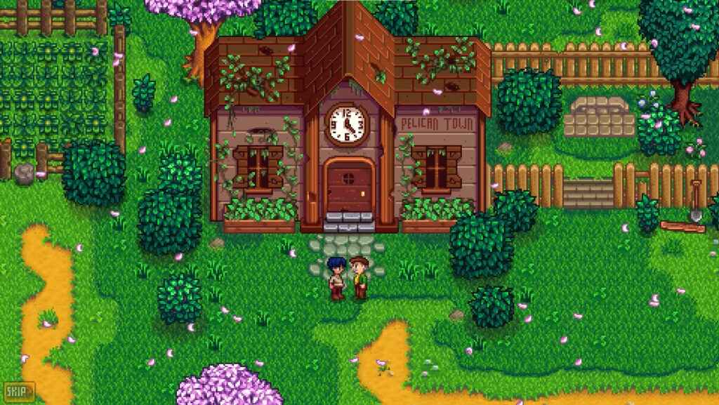 Two Stardew Valley characters speak in front of a building.