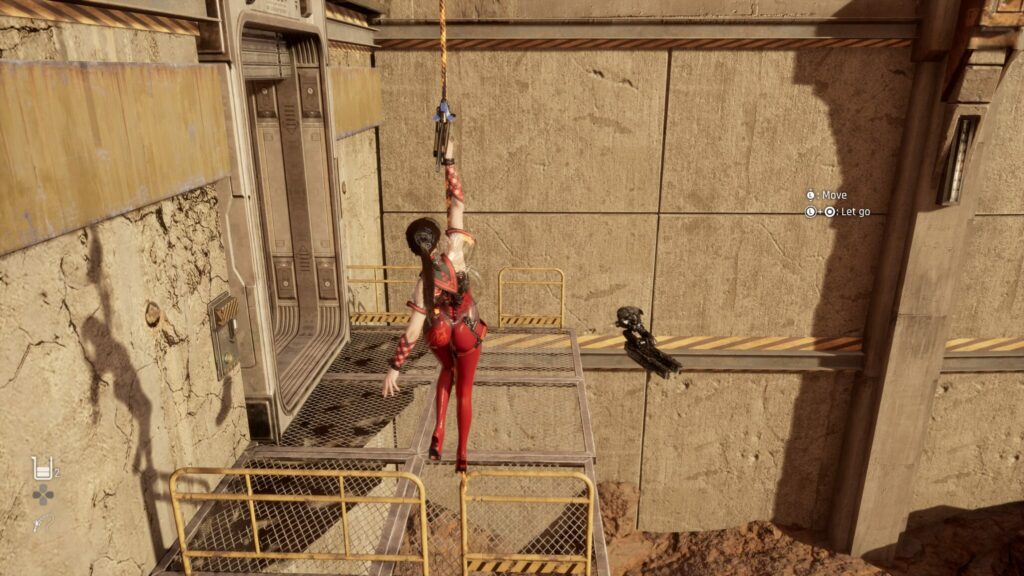 EVE holds onto an ascension rope.