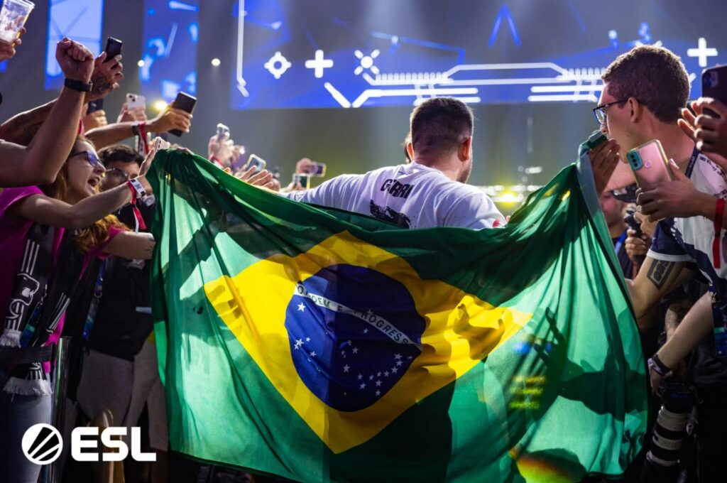 A player holding the Brazilian flag at IEM Rio.