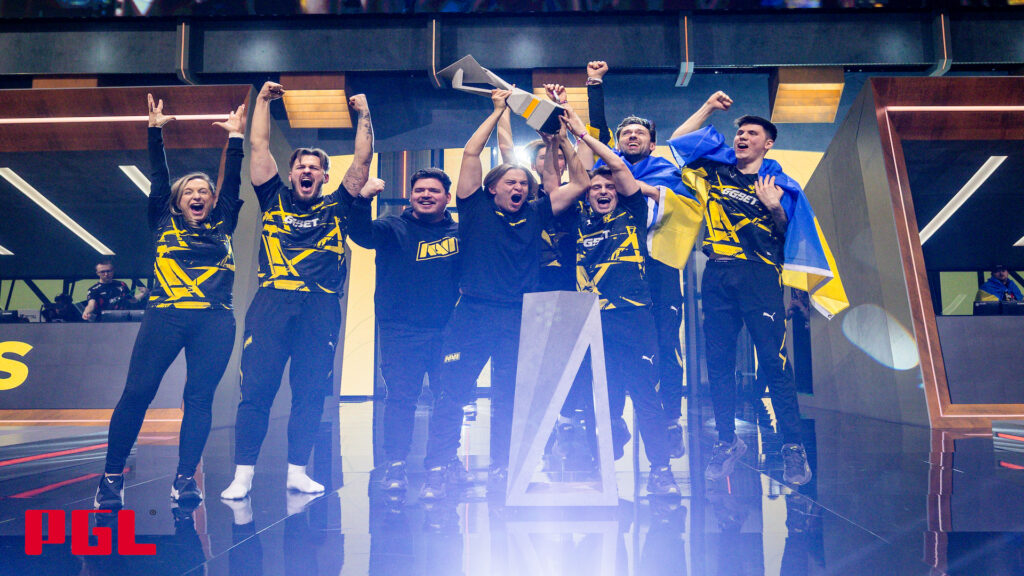 All NAVI CS2 players and the coach pose with the PGL Copenhagen Major trophy.