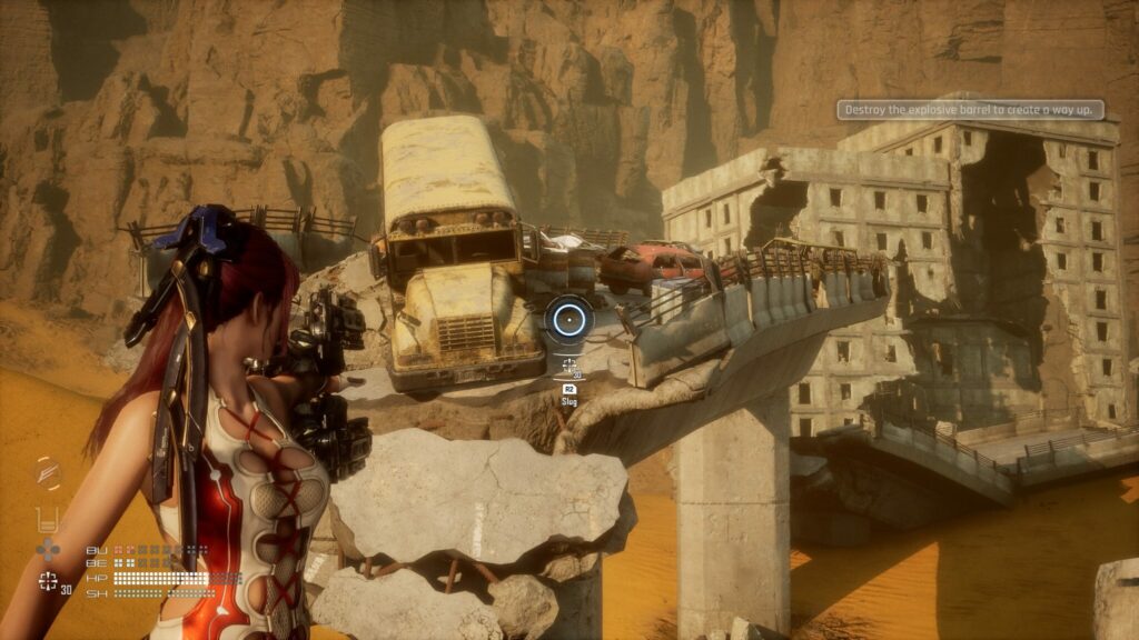 EVE aims her gun at the explosive barrels.