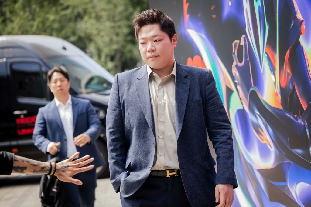 Coach Kim "Kim" Jung-su of Gen.G Esports arrives to compete during Mid-Season Invitational Finals at the Chengdu Financial City Performing Arts Center in Chengdu, China on May 19, 2024. (Photo by Colin Young-Wolff/Riot Games)