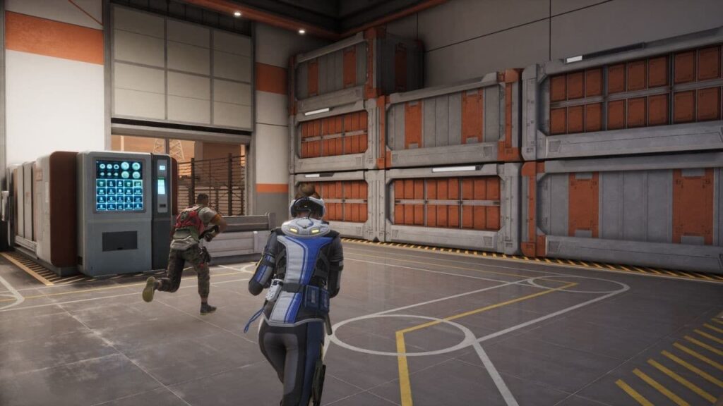 Two Rogues move through a warehouse together in Rogue Company.