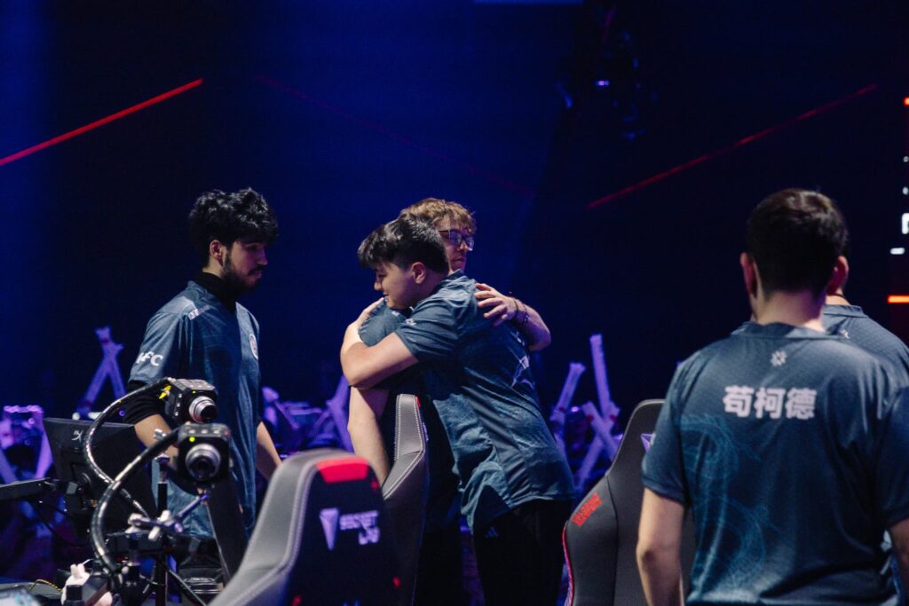 Leviatán, with tex and C0M hugging, react on stage during the VALORANT Masters Shanghai Swiss Stage Day 2 at the VCT CN Studio on May 24, 2024 in Shanghai, China.