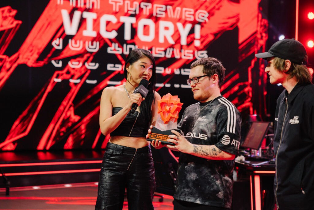 Esports host “Smix” (L) interviews “Boostio” of 100 Thieves onstage after victory during VCT Americas Mid-Season Finals at the Riot Games Arena on May 12, 2024. 
