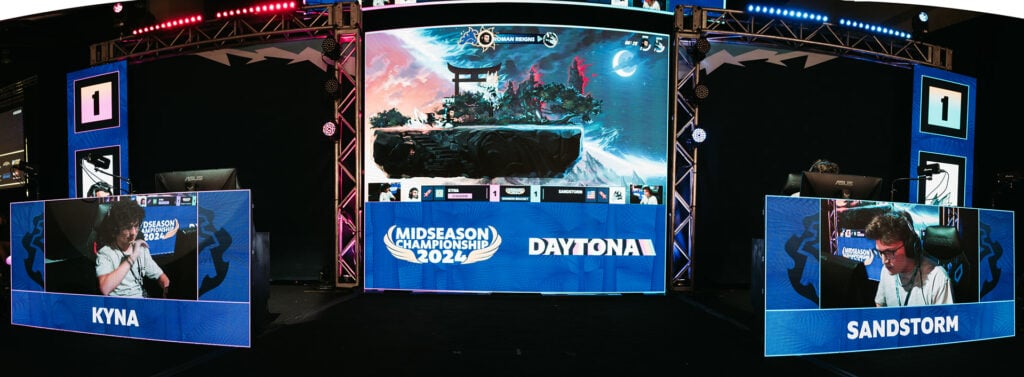 A photo of the scene at the Brawlhalla Midseason Championship 2024, where Kyna and Sandstorm are playing a match