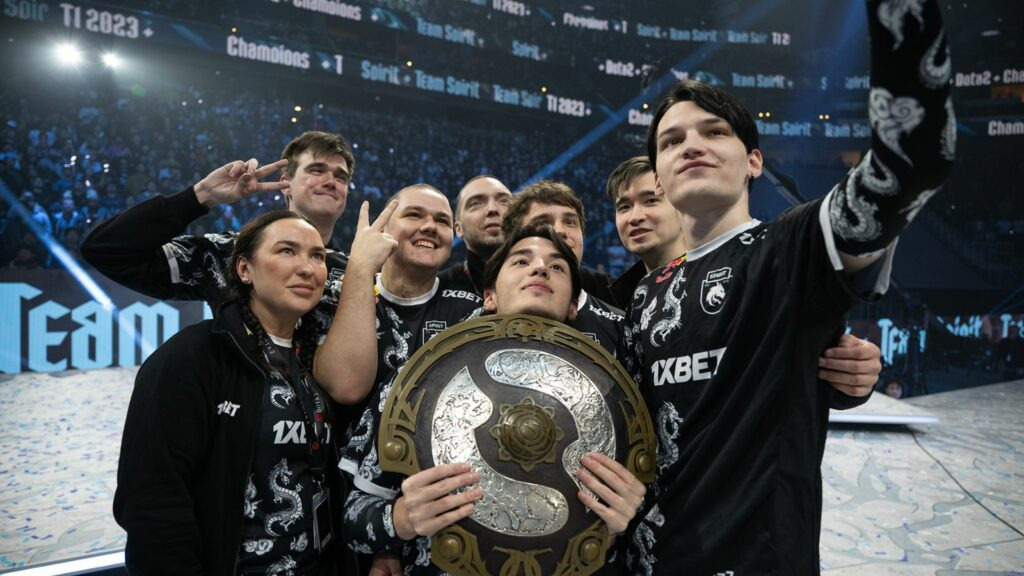 Team Spirit's Dota 2 team poses with the Aegis of Champions for the second time following their win in 2023.