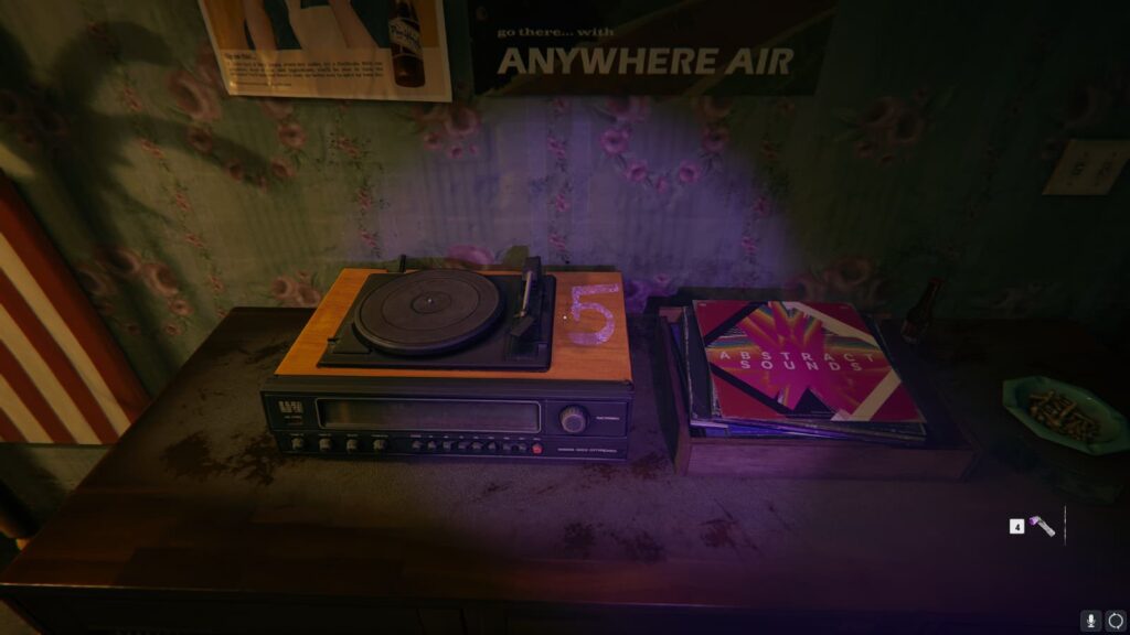 The blacklight shines on a record player.
