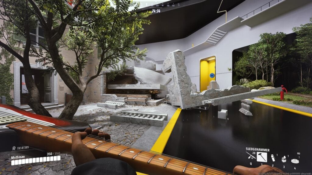 A heavy used a sledgehammer to take down a wall.