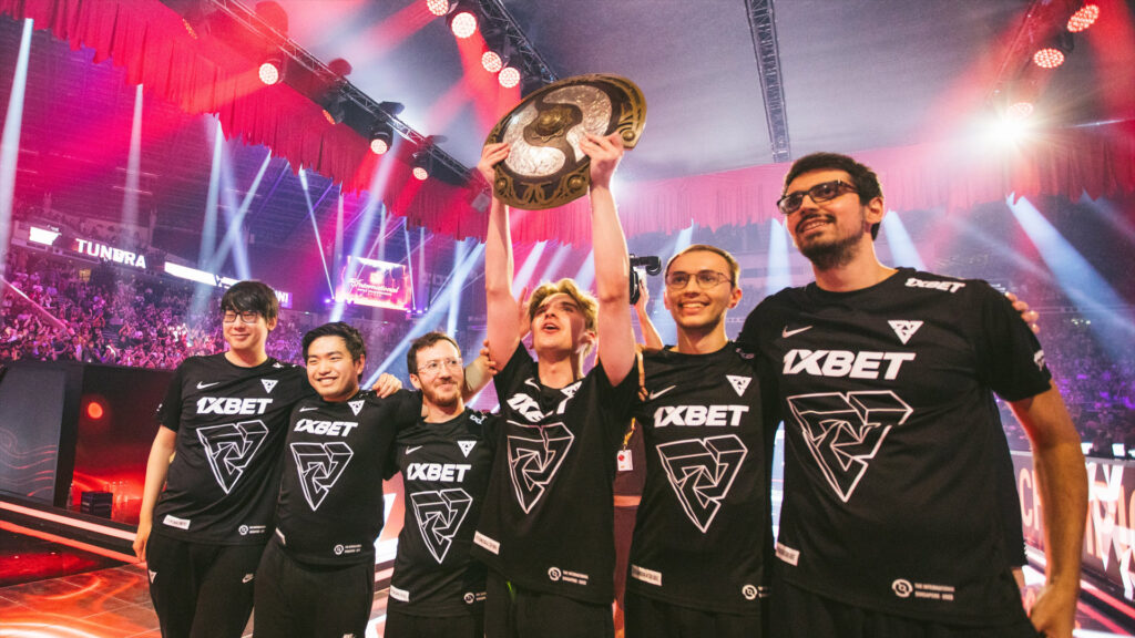 Tundra lift the Aegis in front of a packed-out Singapore crowd at TI 2022.