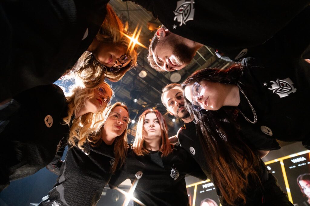 G2 Gozen huddle onstage at the 2024 VALORANT Game Changers Championship Knockouts stage in Berlin, Germany on November 15, 2024.