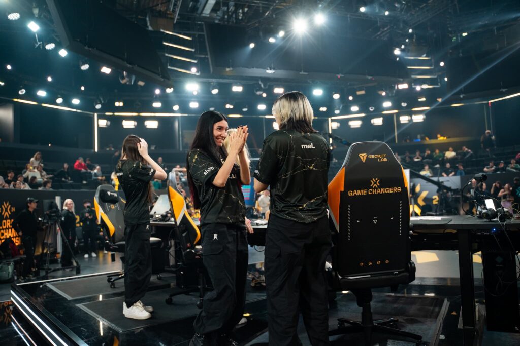 alexis (L) and meL of Shopify Rebellion hug onstage at the 2024 VALORANT Game Changers Championship Knockouts stage in Berlin, Germany on November 13, 2024. 