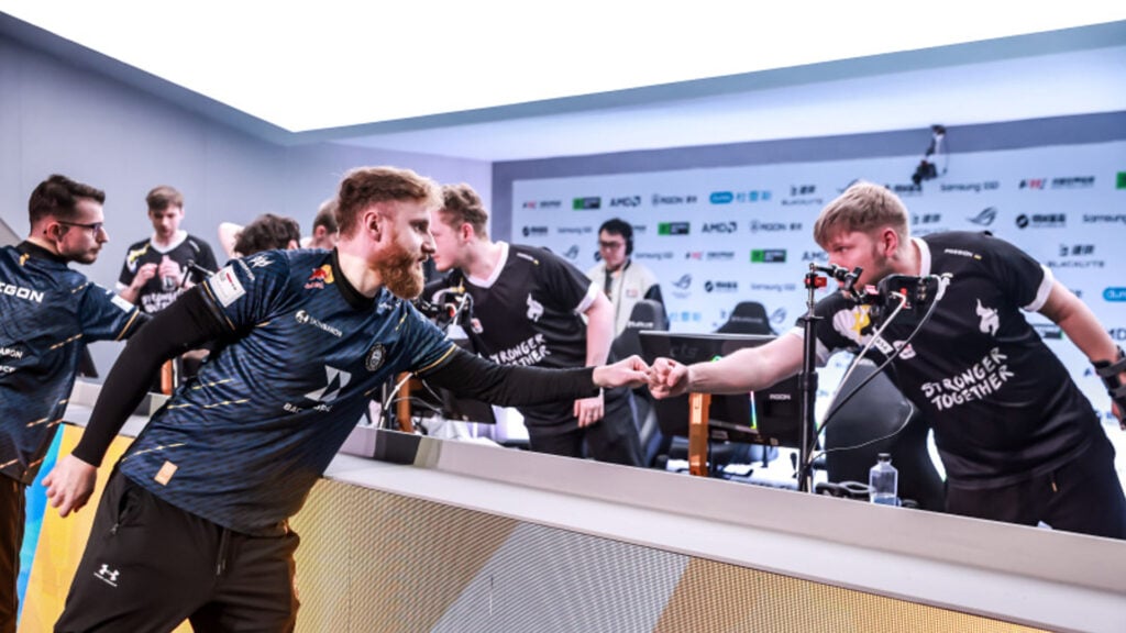 BIG and Passion UA shake hands after Shanghai Major 2024 match.