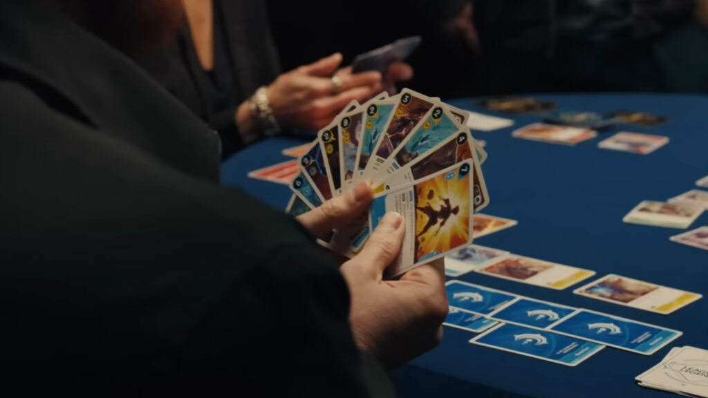 Project K's sneak-peak to how the game will be played on the announcement trailer. In this picture, we see horizontal and vertical positions for the card in the table, while the player's hand isn't visible for the opponent.