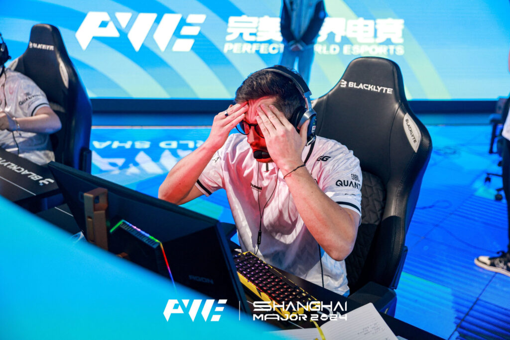 ApEX sits at his PC at the Shanghai Major.