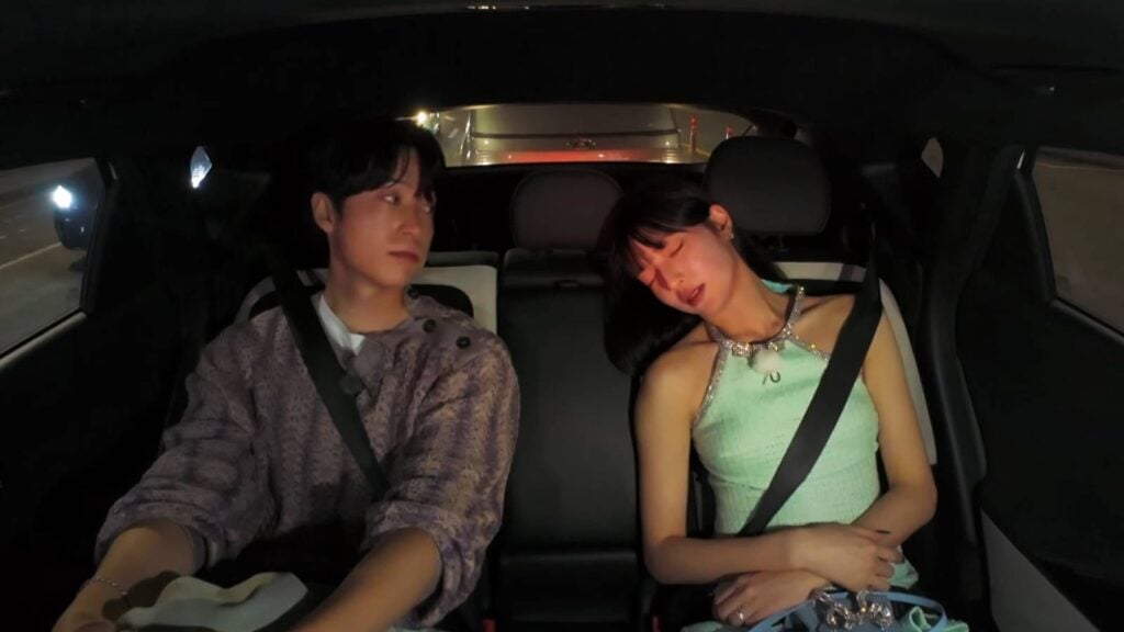 Park Hae-Lin sleeps in a car while Kook Dong-Ho watches her: Single’s Inferno Season 4, Ep. 6.