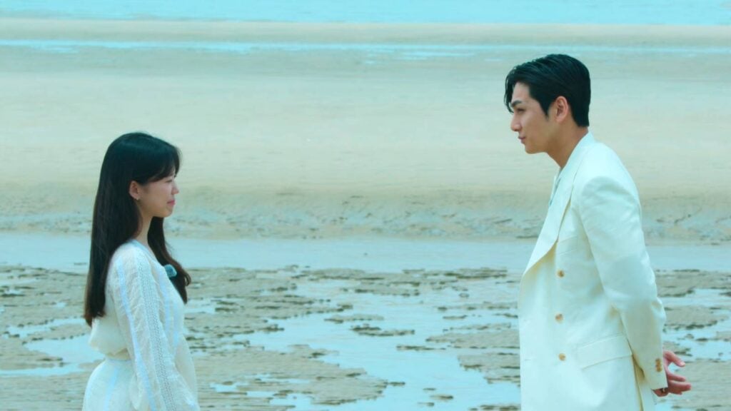 Two contestants of Single’s Inferno Season 2 are in this image: Lee So-e and Kim Se-jun are on the beach before they take each other’s hand and leave the show as a couple.